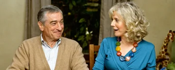 Jack And Dina Byrnes Sat At A Table Laughing