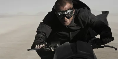 Priest Riding A Motorbike