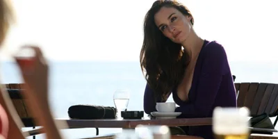 Catalina Sitting at Table