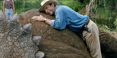 Man Hugging Dinosaur