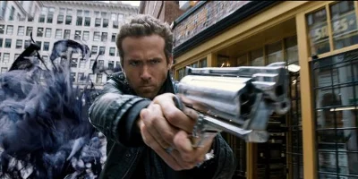Ryan Reynolds Aiming Down Gun