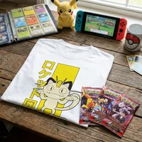 Pokémon Team Rocket Meowth T-Shirt & Pokémon TCG Bundle - 3 x Destined Rivals Booster Packs